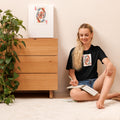Black unisex t-shirt with Love Card print design, front view – iNKORART Studio